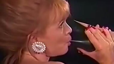 Lesbian sucking on a High Heel