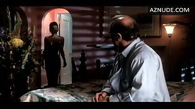 .C.  Webb in 1990 movie in black satin panties stockings