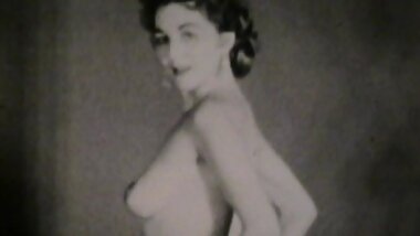 Hot vintage scene with curly-haired brunette