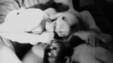 Brunette gives a blowjob and gets fucked in a threesome