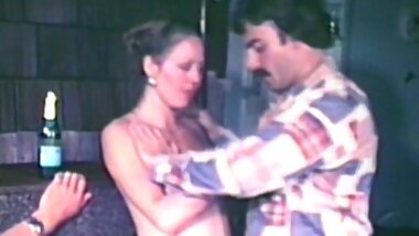 Dark-haired brunette is sucking a dick