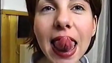 Cute Babe Shows Her Long Tongue